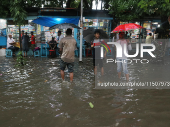 A street floods during the heavy monsoon rain in Kolkata, India, on August 24, 2024. (