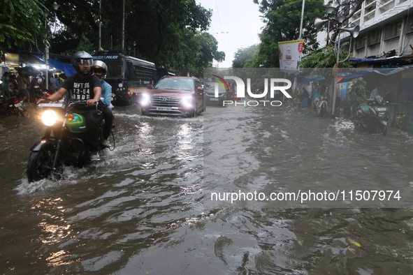 A street floods during the heavy monsoon rain in Kolkata, India, on August 24, 2024. 