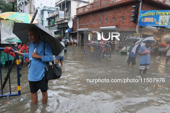 A street floods during the heavy monsoon rain in Kolkata, India, on August 24, 2024. 