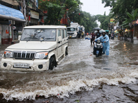 A Mahindra Bolero car drives through a water-logged street after heavy monsoon rain in Kolkata, India, on August 24, 2024. (