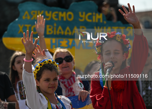 KRAKOW, POLAND - AUGUST 24:
Members of the Ukrainian diaspora in Krakow celebrate Ukrainian Independence Day with various events, including...