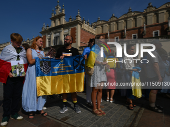 KRAKOW, POLAND - AUGUST 24:
Members of the Ukrainian diaspora in Krakow celebrate Ukrainian Independence Day with various events, including...