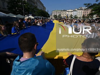 KRAKOW, POLAND - AUGUST 24:
Members of the Ukrainian diaspora in Krakow celebrate Ukrainian Independence Day with various events, including...