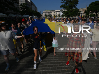 KRAKOW, POLAND - AUGUST 24:
Members of the Ukrainian diaspora in Krakow celebrate Ukrainian Independence Day with various events, including...