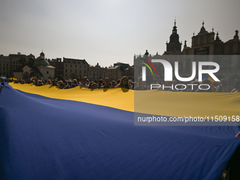 KRAKOW, POLAND - AUGUST 24:
Members of the Ukrainian diaspora in Krakow celebrate Ukrainian Independence Day with various events, including...