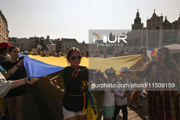 KRAKOW, POLAND - AUGUST 24:
Members of the Ukrainian diaspora in Krakow celebrate Ukrainian Independence Day with various events, including...