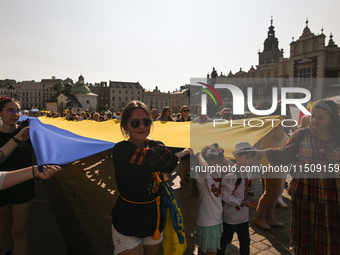 KRAKOW, POLAND - AUGUST 24:
Members of the Ukrainian diaspora in Krakow celebrate Ukrainian Independence Day with various events, including...