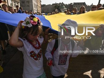 KRAKOW, POLAND - AUGUST 24:
Members of the Ukrainian diaspora in Krakow celebrate Ukrainian Independence Day with various events, including...