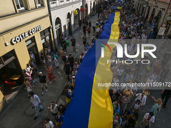 KRAKOW, POLAND - AUGUST 24:
Members of the Ukrainian diaspora in Krakow celebrate Ukrainian Independence Day with various events, including...