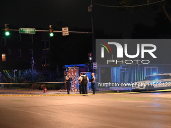 Three people are shot, one in critical condition, on the 3600 block of W. Douglas Blvd in Chicago, Illinois, United States, on August 24, 20...