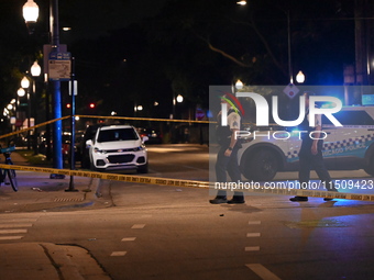 Three people are shot, one in critical condition, on the 3600 block of W. Douglas Blvd in Chicago, Illinois, United States, on August 24, 20...