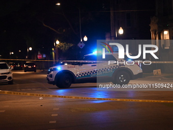 Three people are shot, one in critical condition, on the 3600 block of W. Douglas Blvd in Chicago, Illinois, United States, on August 24, 20...