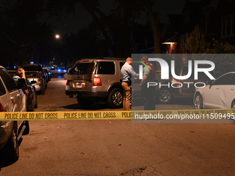 An unidentified male is shot and killed on the 2400 block of S. Christiana Avenue in Chicago, Illinois, United States, on August 24, 2024. A...