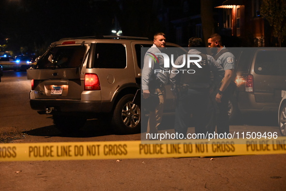 An unidentified male is shot and killed on the 2400 block of S. Christiana Avenue in Chicago, Illinois, United States, on August 24, 2024. A...