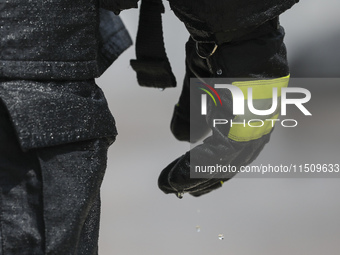 Firefighters participate in a rescue drill at a chemical company in Huai'an, Jiangsu province, China, on August 25, 2024. (