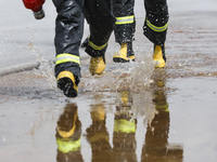 Firefighters participate in a rescue drill at a chemical company in Huai'an, Jiangsu province, China, on August 25, 2024. (