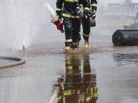 Firefighters participate in a rescue drill at a chemical company in Huai'an, Jiangsu province, China, on August 25, 2024. (