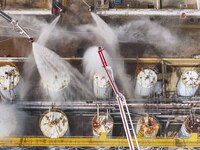 Firefighters participate in a rescue drill at a chemical company in Huai'an, Jiangsu province, China, on August 25, 2024. (