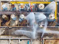 Firefighters participate in a rescue drill at a chemical company in Huai'an, Jiangsu province, China, on August 25, 2024. (