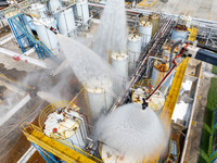 Firefighters participate in a rescue drill at a chemical company in Huai'an, Jiangsu province, China, on August 25, 2024. (