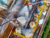 Firefighters participate in a rescue drill at a chemical company in Huai'an, Jiangsu province, China, on August 25, 2024. (