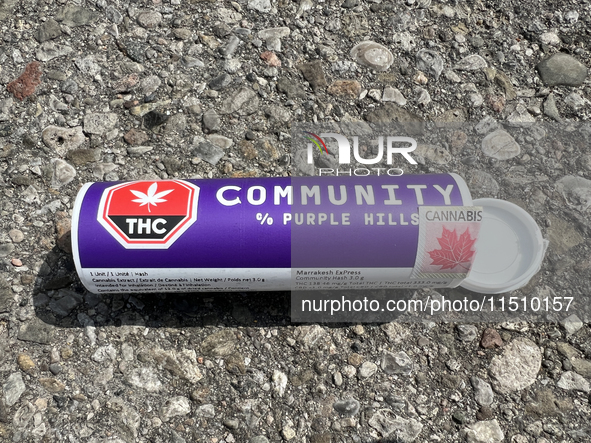 Discarded packaging from cannabis products lies in the parking lot of an elementary school in Toronto, Ontario, Canada, on August 24, 2024. 