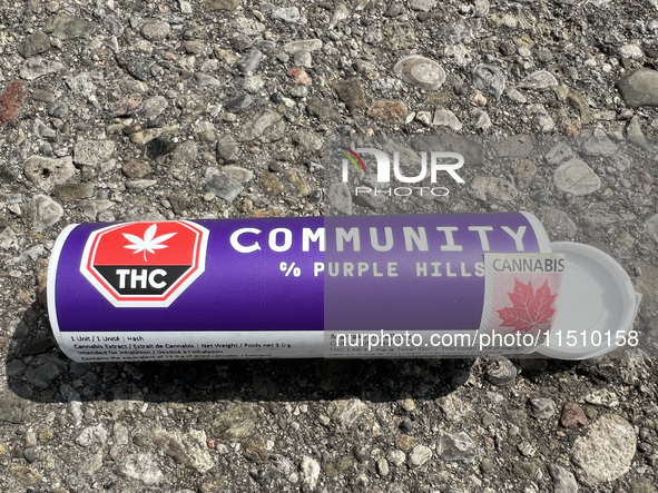 Discarded packaging from cannabis products lies in the parking lot of an elementary school in Toronto, Ontario, Canada, on August 24, 2024. 