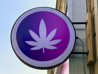 A sign on a shop selling cannabis and marijuana paraphernalia in downtown Toronto, Ontario, Canada, on August 14, 2024. (