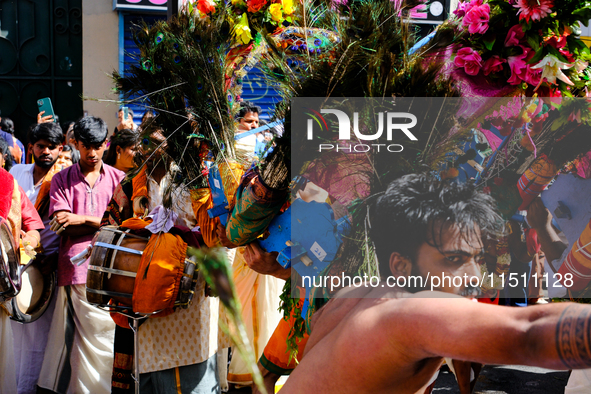 A dancer performs in front of the audience at the annual Ganesh Chaturthi Hindu celebration in the streets of Paris, France, in Paris, Franc...