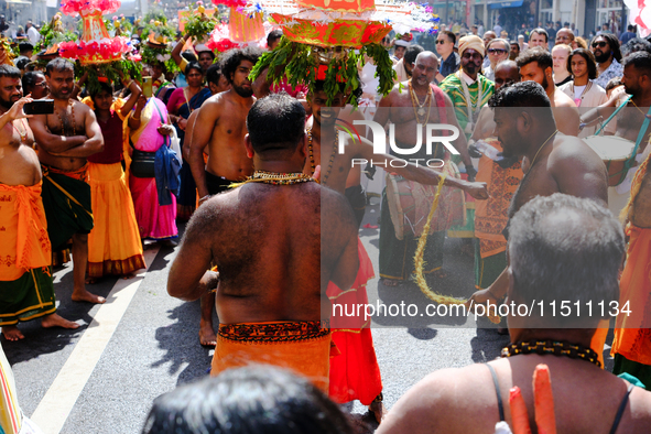 Hindu flagellants take part in the Ganesh Chaturthi procession, in Paris, France, on August 25, 2024.  