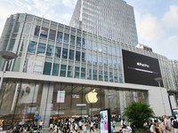 Students experience Apple products at the Apple flagship store in Shanghai, China, on August 22, 2024. (