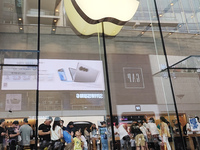 Students experience Apple products at the Apple flagship store in Shanghai, China, on August 22, 2024. (