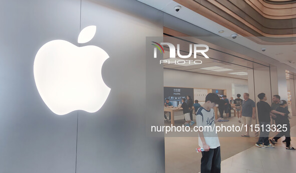 Students experience Apple products at the Apple flagship store in Shanghai, China, on August 22, 2024. 