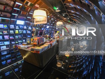 People read at Zhongshuge Bookstore in Guiyang, China, on August 18, 2024. (