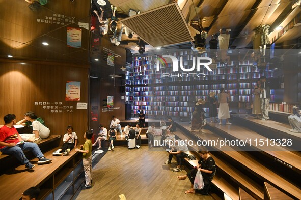 People read at Zhongshuge Bookstore in Guiyang, China, on August 18, 2024. 