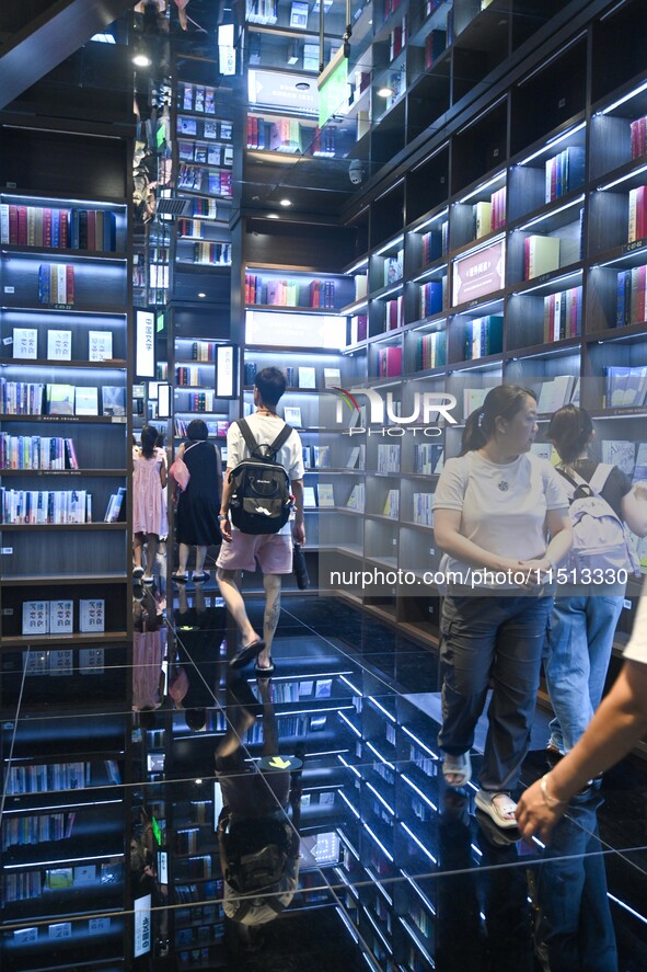 People read at Zhongshuge Bookstore in Guiyang, China, on August 18, 2024. 