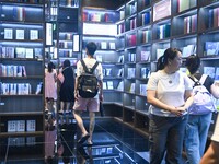 People read at Zhongshuge Bookstore in Guiyang, China, on August 18, 2024. (