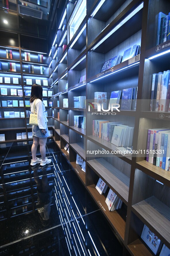 People read at Zhongshuge Bookstore in Guiyang, China, on August 18, 2024. 