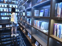 People read at Zhongshuge Bookstore in Guiyang, China, on August 18, 2024. (