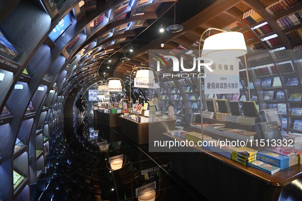 People read at Zhongshuge Bookstore in Guiyang, China, on August 18, 2024. 