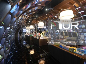 People read at Zhongshuge Bookstore in Guiyang, China, on August 18, 2024. (