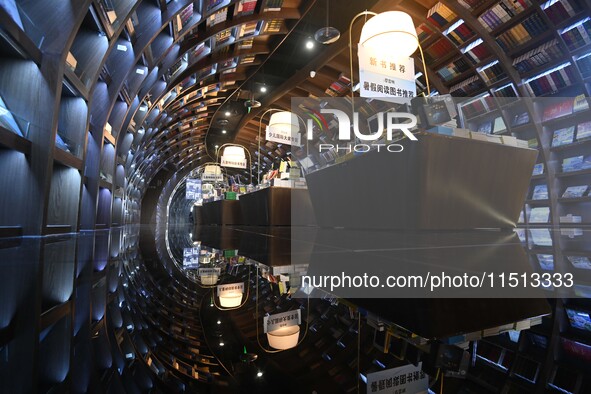 People read at Zhongshuge Bookstore in Guiyang, China, on August 18, 2024. 