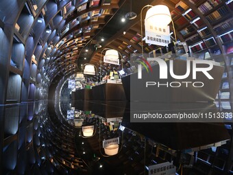 People read at Zhongshuge Bookstore in Guiyang, China, on August 18, 2024. (