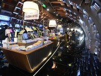 People read at Zhongshuge Bookstore in Guiyang, China, on August 18, 2024. (