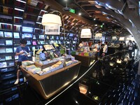 People read at Zhongshuge Bookstore in Guiyang, China, on August 18, 2024. (