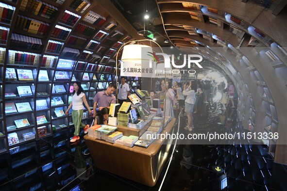 People read at Zhongshuge Bookstore in Guiyang, China, on August 18, 2024. 