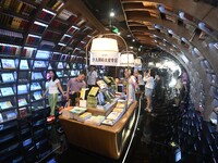 People read at Zhongshuge Bookstore in Guiyang, China, on August 18, 2024. (