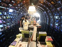 People read at Zhongshuge Bookstore in Guiyang, China, on August 18, 2024. (