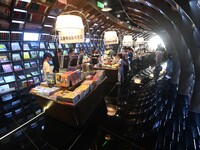 People read at Zhongshuge Bookstore in Guiyang, China, on August 18, 2024. (