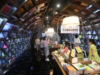 People read at Zhongshuge Bookstore in Guiyang, China, on August 18, 2024. (